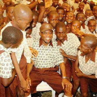 Osun-State-Governor-Rauf-Aregbesola-wears-school-uniform