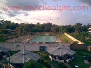 A portion of the Pepsi Garden(behind Queen Amina Hall) with the the swimming pool behind it.