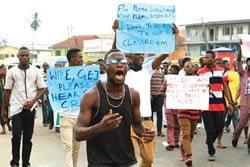 A cross-section of students of Yaba College of Technology protesting the prolonged strike embarked upon by public polytechnic lecturers in Lagos... on Friday.