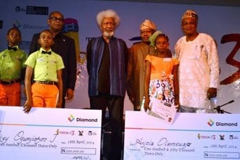The first and second place winners, Anjola and Joseph, with Prof. Wole Soyinka, and other dignitaries during the prize presentation ceremony.