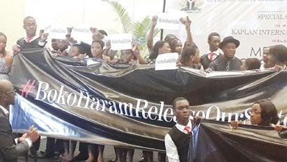 *The 160 Niger Delta students who won scholarships to study in the UK and USA calling on Boko Haram for immediate release of their sisters during their unveiling to the media, in Lagos. 
